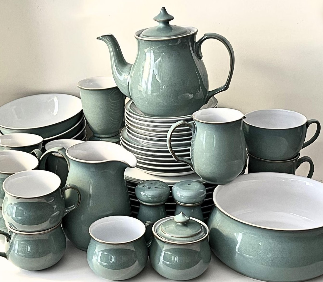 Sage green stoneware tea and coffee service with teapot, jugs and cups